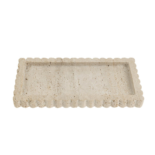 Rectangular stone tray with scalloped edge on a white background