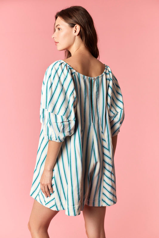 Women wearing a blue and white stripe romper.