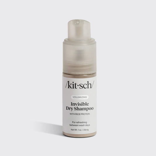 Kitsch invisible dry shampoo bottle on a light gray background