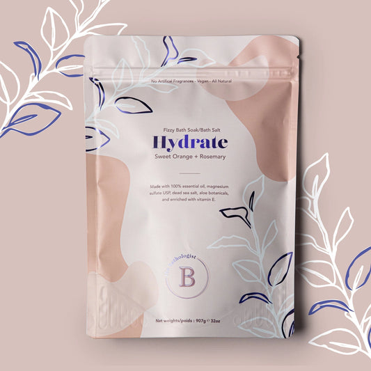 Bath salt package labeled 'Hydrate' with decorative elements on a beige background