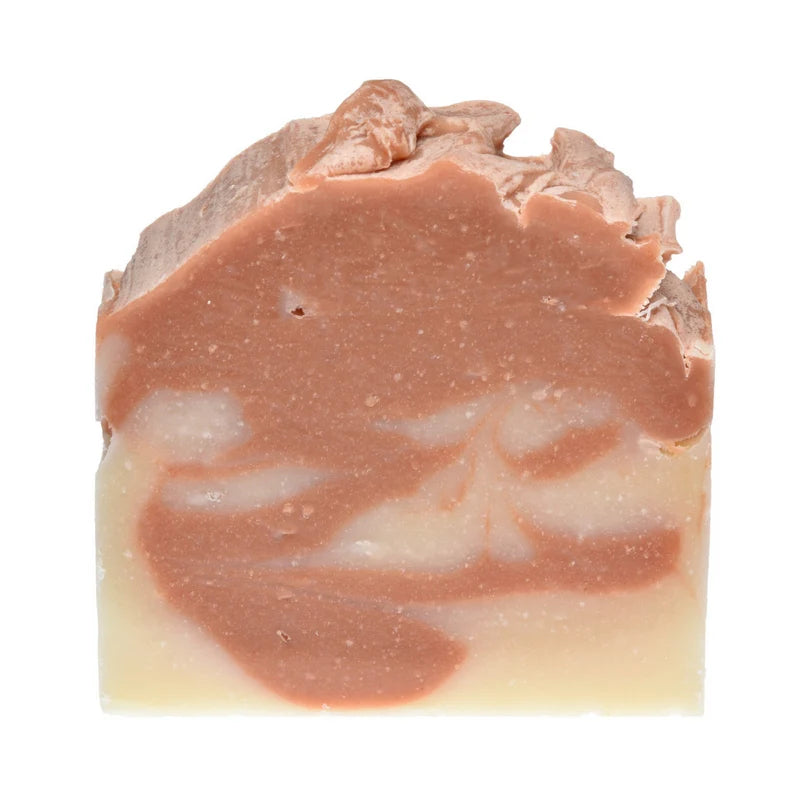 Bar of soap with a marbled design on a white background