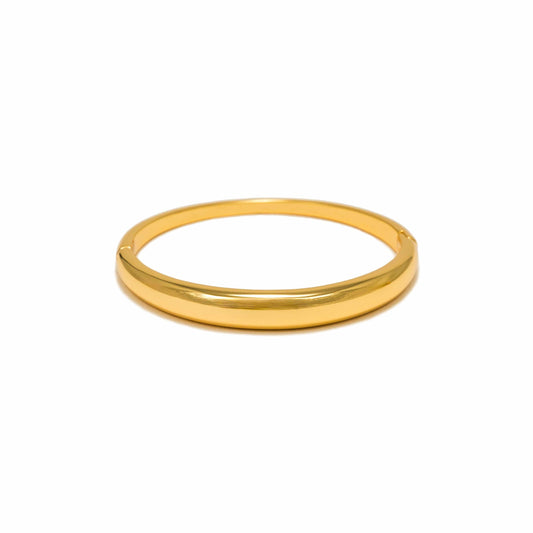 Gold ring on a white background