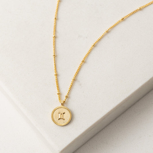 a gemini gold necklace