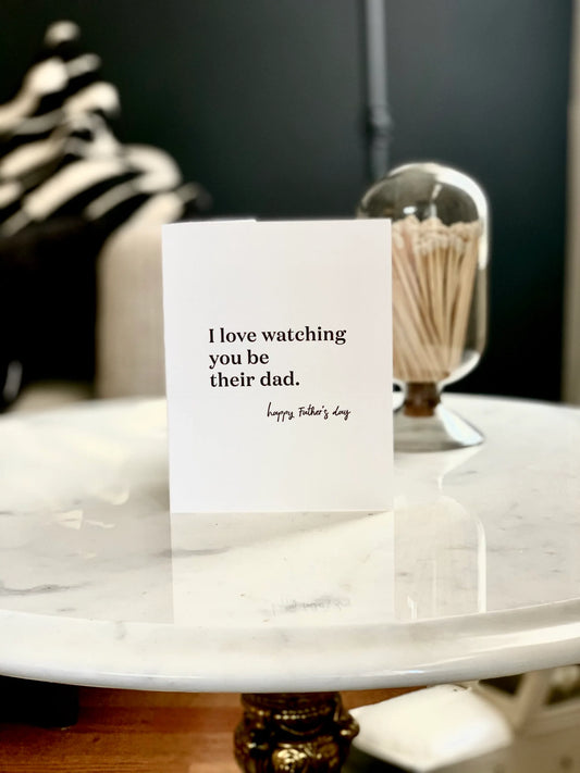 Greeting card on a marble surface with decorative elements