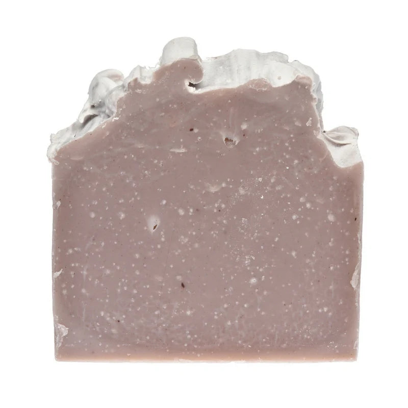 Bar of soap with a textured surface on a white background