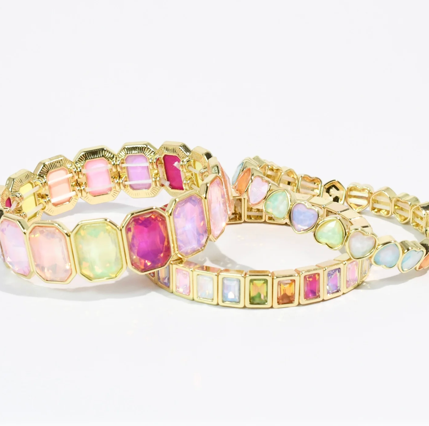 A bright colourful bracelet stack.