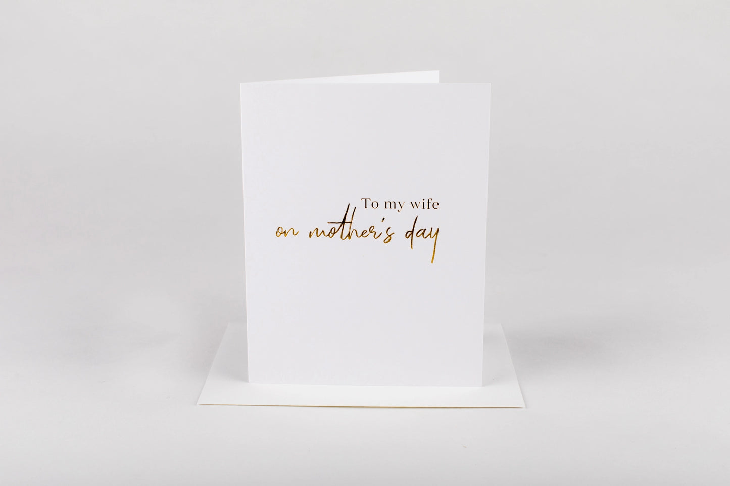 Greeting card with 'To my wife on Mother's Day' text on a white background