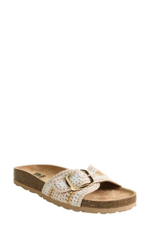 Single sandal with decorative strap on a white background