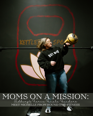 a women with a boy mom sweatshirt in her gym