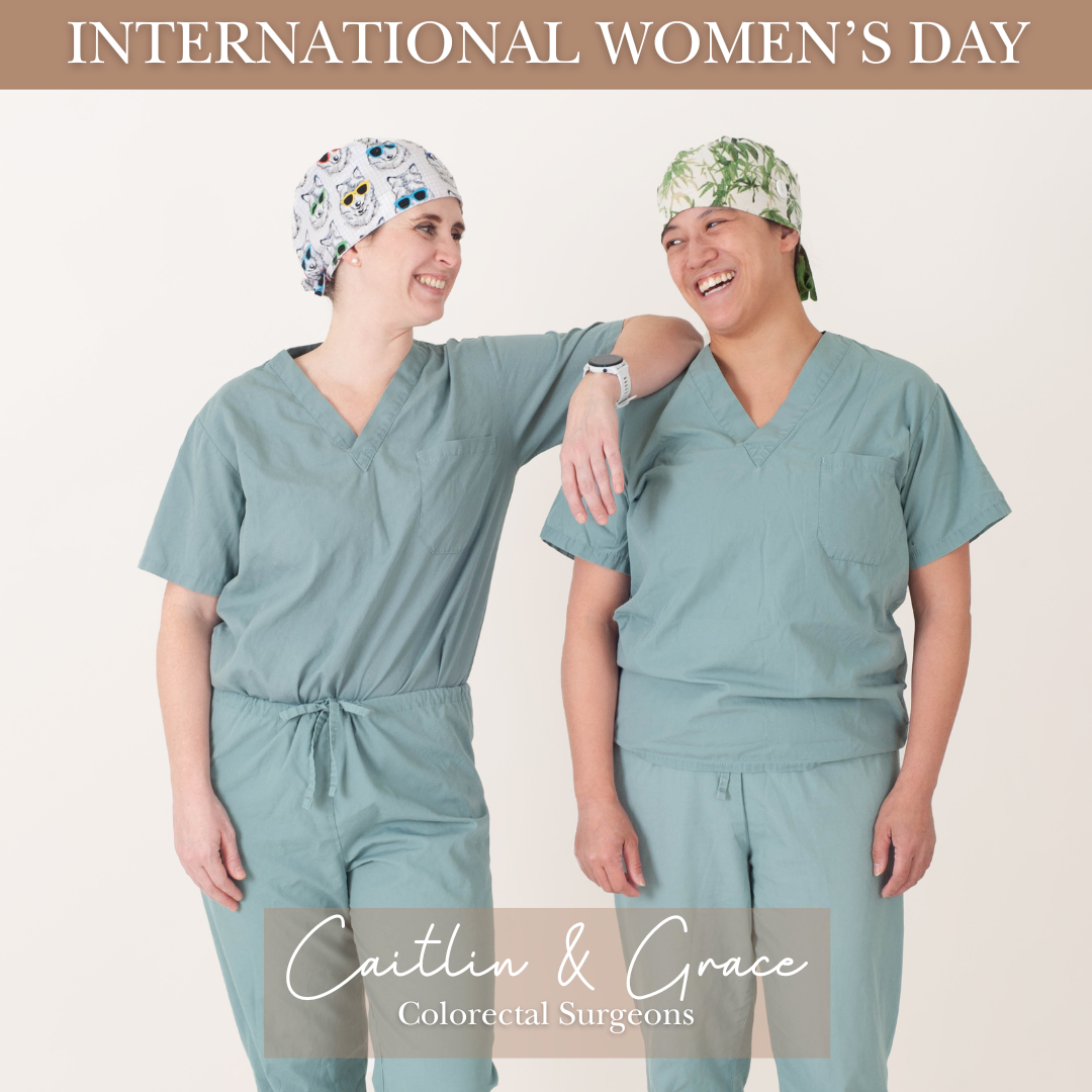 two women wearing a doctors scrubs celebrating international womens day