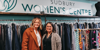 a photo of two women at a charity