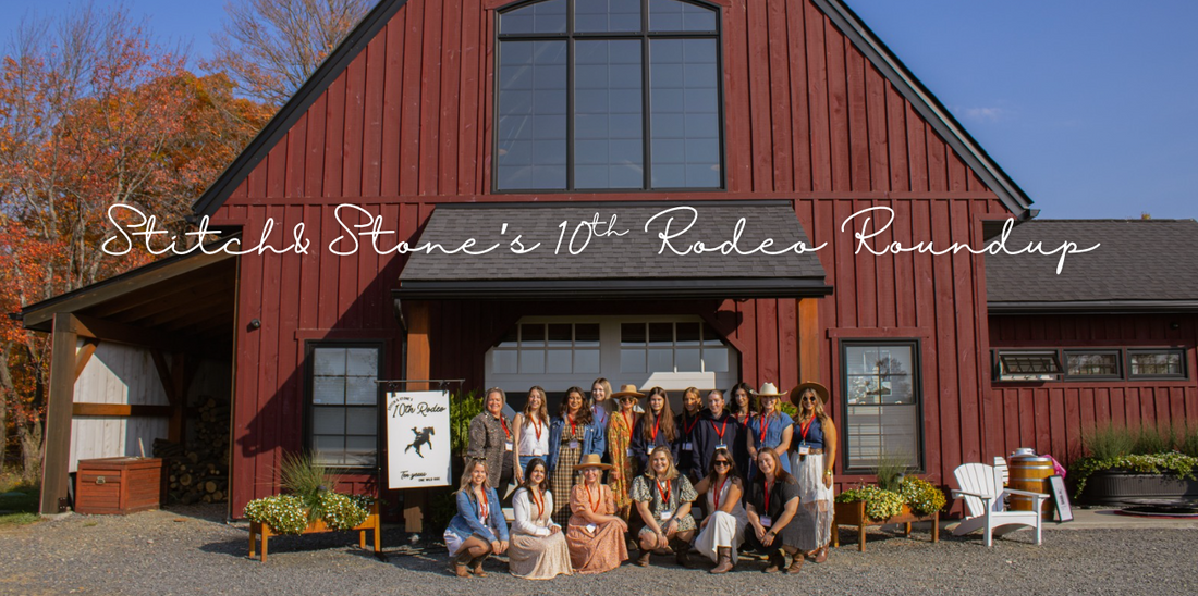 a group shot of Stitch & Stone staff in front a barn at their 10 year anniversary event
