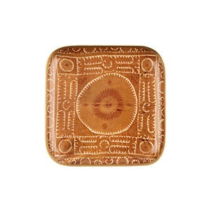 Decorative brown square plate with embossed patterns on a white background