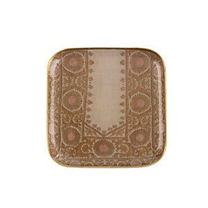 Decorative square plate with intricate patterns on a white background