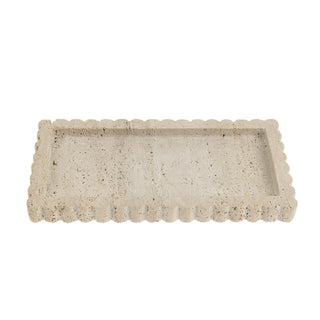 Rectangular stone tray with scalloped edge on a white background