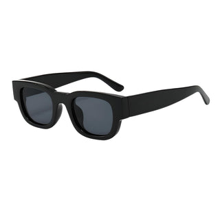 a pair of black sunglasses on a white background