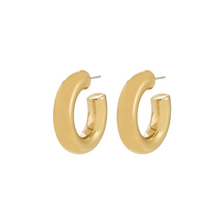 Gold hoop earrings on a white background