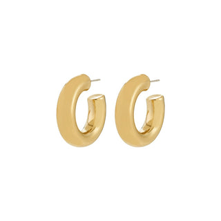 Gold hoop earrings on a white background