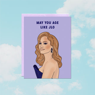 Card with illustration of a Jennifer Lopez and text 'May you age like JLO' 