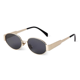 A pair of oval frame sunglasses with gold hardware and grey lenses.