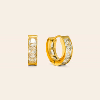 a pair of diamond gold hoop earrings.