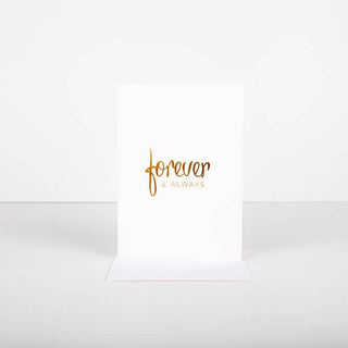 White card with 'forever & always' text in gold on a white background