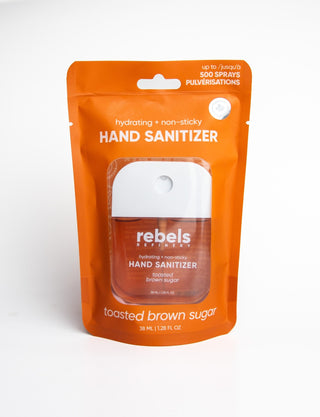 Hand sanitizer packaging with 'rebel' branding on an orange background