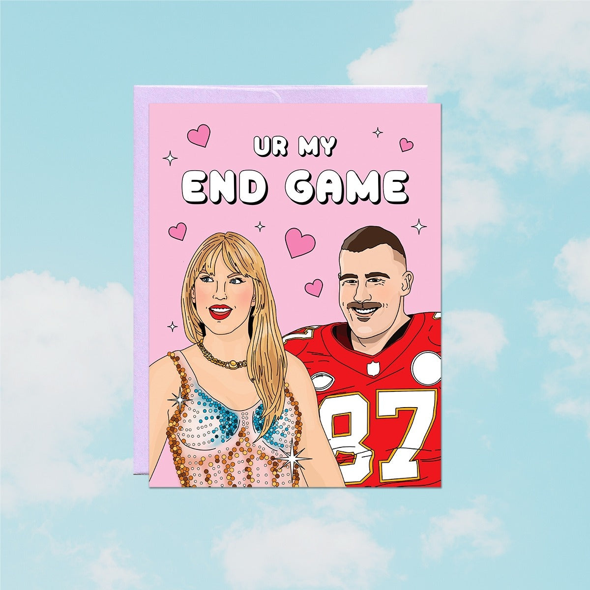 Card with cartoon illustration of a couple on a pink background with 'Ur My End Game' text, against a blue sky with clouds.