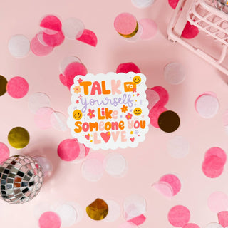 Stickers with a quote 'What a good day to be proud of the progress you've made' on a pink background with confetti and decorative items around.