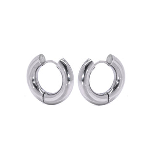 a pair of silver hoop earrings