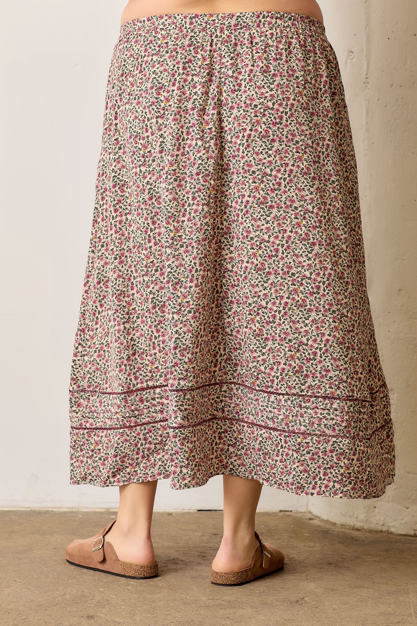 Women wearing a floral maxi skirt
