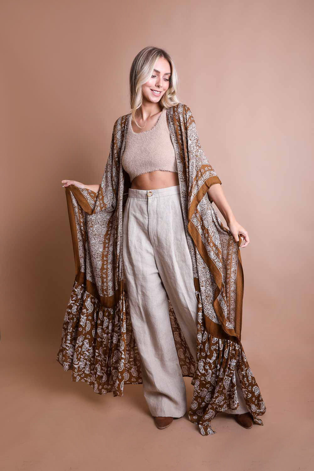 Women in long bohemian kimono shawl cover up