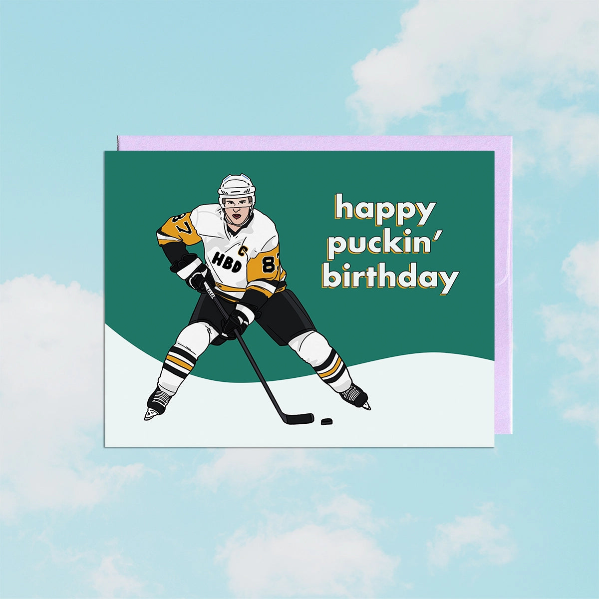 Hockey-themed birthday card with a player illustration and text that says "happy puckin' birthday"