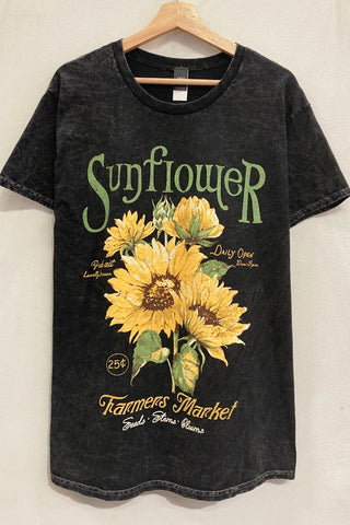 Black t-shirt with sunflower design and text on a white background