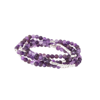 a beaded crystal wrap bracelet of necklace on a white background