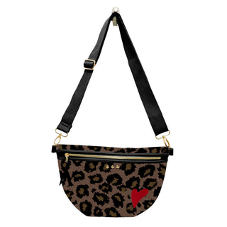 A leopard print fanny pack with a black strap, gold-tone hardware, and a red heart on the front, shown against a plain white background.