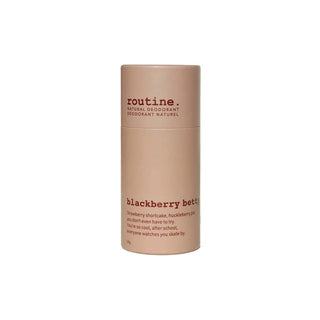 A beige cylindrical deodorant stick container labeled 'routine. natural deodorant' and 'blackberry butter' on a plain white background.