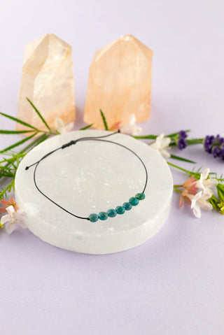 a beaded crystal bracelet with nylon. 