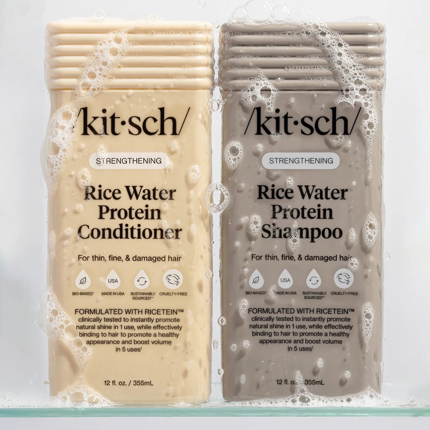 Two packets of Kitsch Rice Water Protein Shampoo and Conditioner on a light gray background