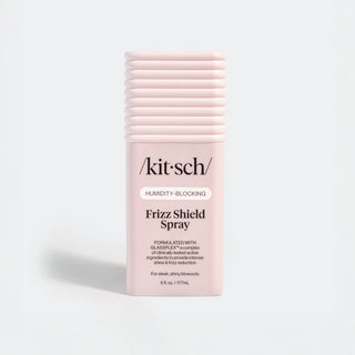 Kit-sch Frizz Shield Spray bottle on a light gray background
