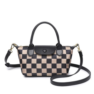 A small structured handbag with a beige and black checkerboard pattern, black leather top handles and trim, gold-tone hardware, and a detachable black shoulder strap, shown on a plain white background.