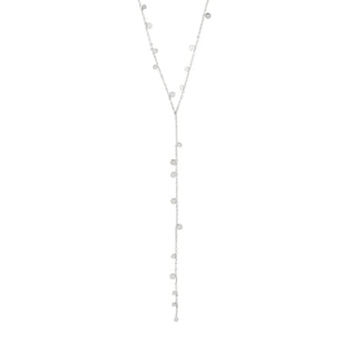 Silver necklace with small beads on a light gray background