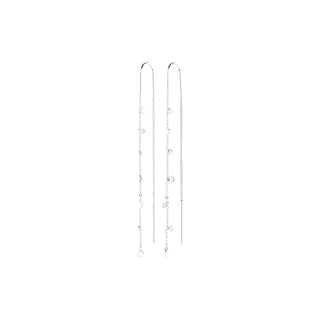 A pair of long, delicate silver dangle earrings with small clear gemstone charms, displayed against a solid white background.