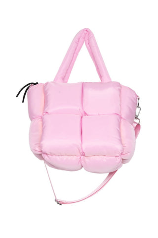 Pink puffer bag with a strap on a white background