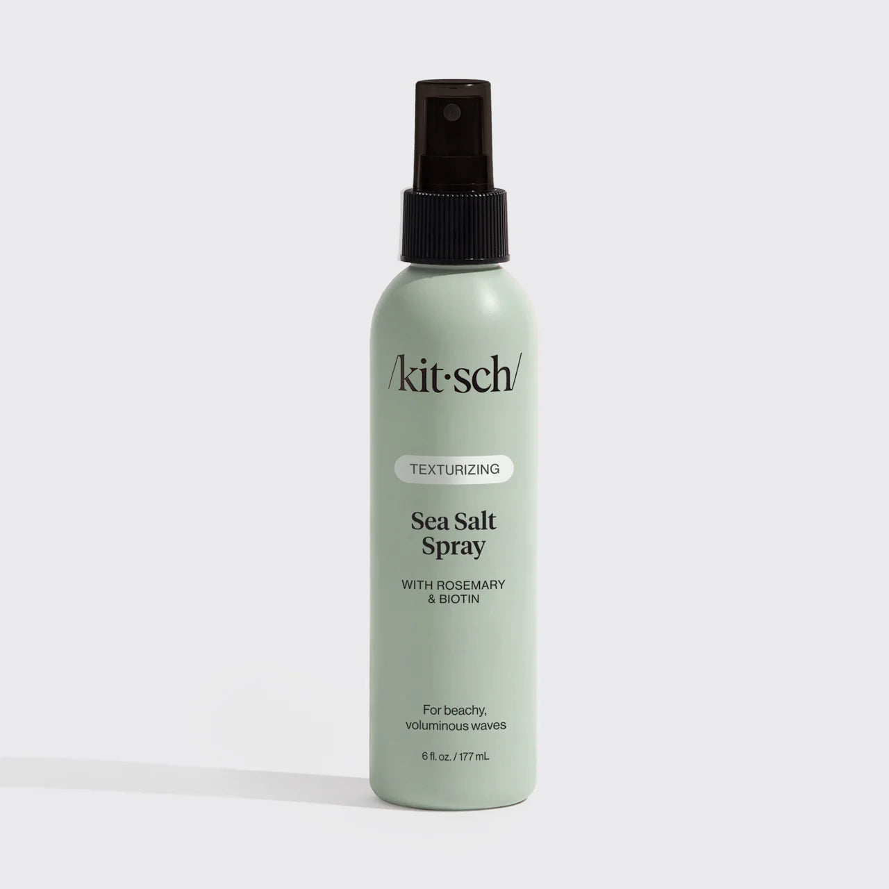 Kitsch sea salt spray bottle on a light gray background