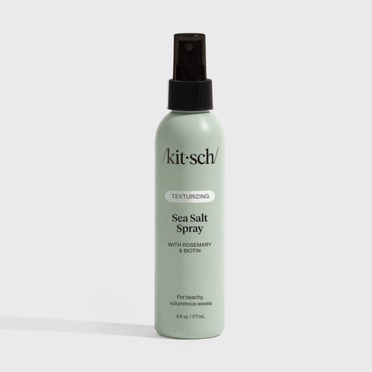 Kitsch sea salt spray bottle on a light gray background