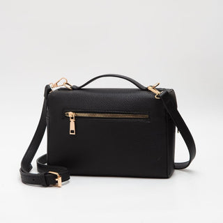 A black pebbled leather handbag with a top handle, detachable shoulder strap, and gold-tone hardware, shown on a clean white background.