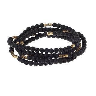 a beaded crystal wrap bracelet of necklace on a white background