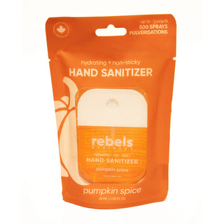 A package of Rebels Refinery pumpkin spice hand sanitizer in a bright orange resealable pouch with a clear window showing the white sanitizer card inside.