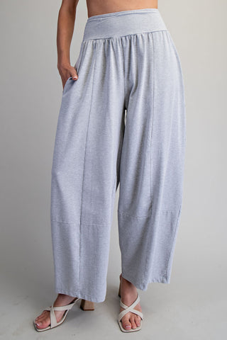 Light gray wide-leg pants worn by a person on a plain background